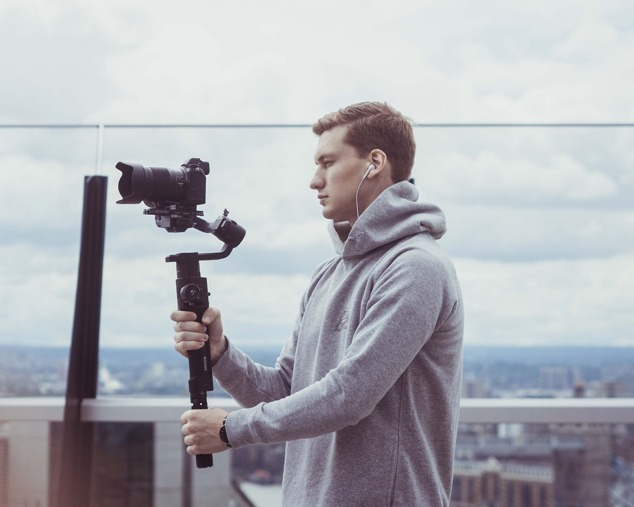 Andreas Sumelius holding a camera in London